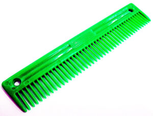 Peine plástico de 23 cm., para crines de caballos.