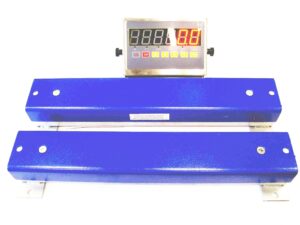 Balanza electr. p/pesar ganado. Cap. 3.000Kg. Barras 58cm cabezal inox.